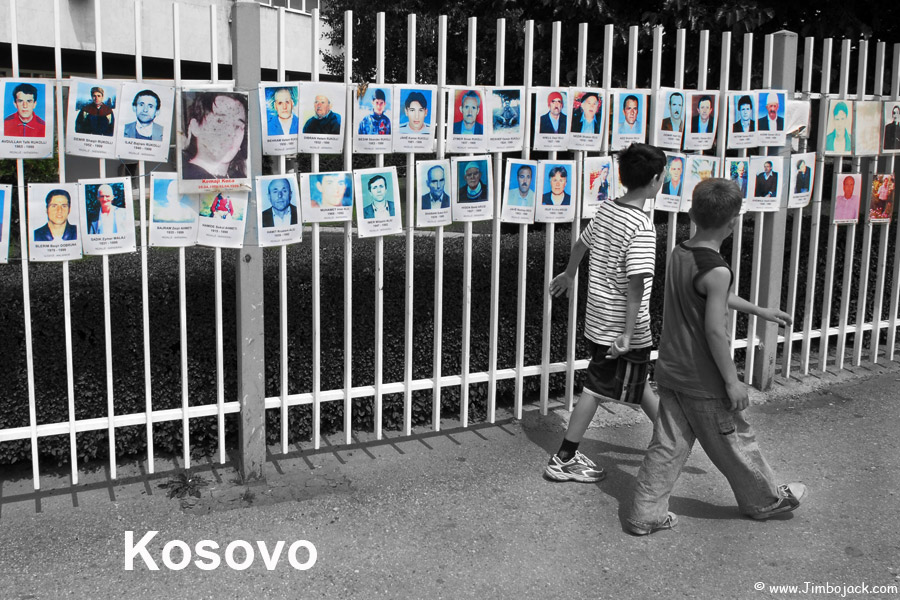 Index - Kosovo - Children walking by photographs of the missing, Pristina