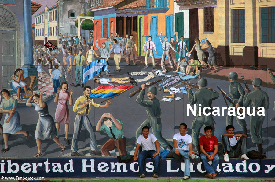 Index - Nicaragua - Students sitting in front of a painted mural, Leon